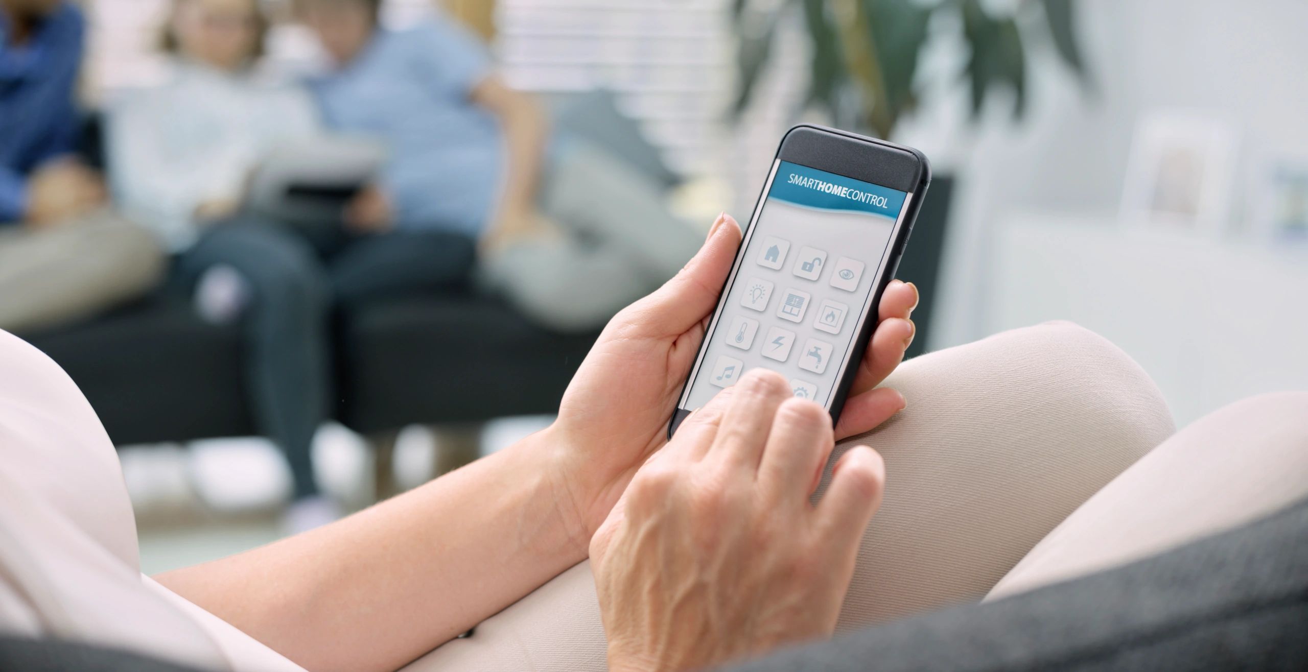 Homeowner using a smartphone to submit a service request
